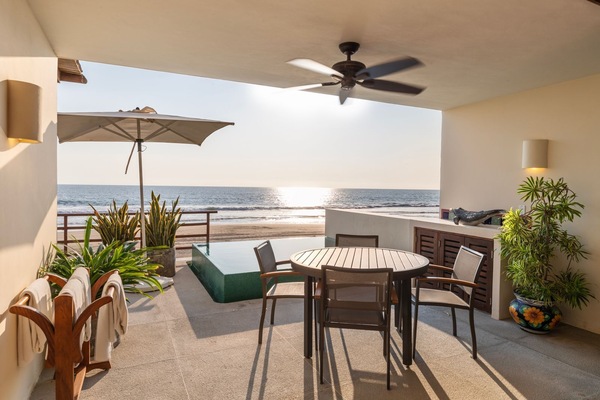 Dine with stunning beachfront views in this open-air dining space, designed for comfort and relaxation.