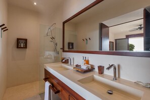 Shower, hair dryer, towels, soap