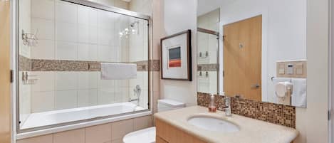 Hair dryer, towels, soap, toilet paper