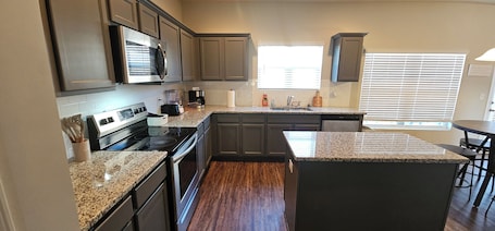 Fridge, microwave, oven, stovetop. Charming 4-bedroom house