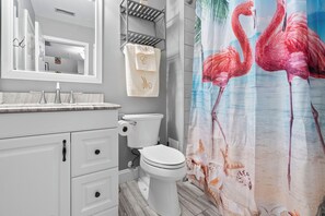 Shower, jetted bath, hair dryer, towels