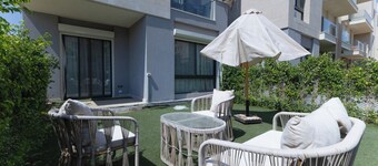 3-bedroom apartment in sheikh zayed with AC, WiFi , garden