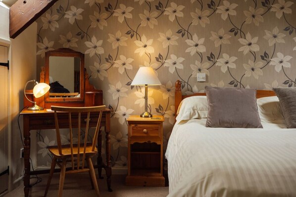 1 bedroom, desk, iron/ironing board, travel crib