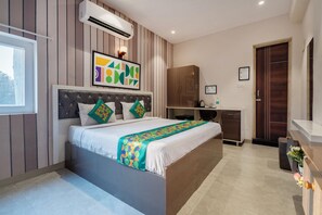 Deluxe Room | Desk, blackout drapes, iron/ironing board, rollaway beds - Treebo Imperia, Kommadi (Visakhapatnam)