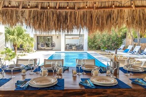 Outdoor dining - Spacious 6BR Luxury Villa with Private Pool at Beach House by Bocobay (Noord)