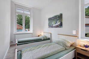 3 dormitorios, tabla de planchar con plancha, wifi gratis y ropa de cama