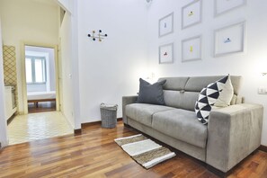 Living area - GuestHost - Very central recently renovated apartment that accommodates up to 4 people. The accommodation is located in a period building from the 1600s, in a historic street of Naples (ZTL) full of commercial activities, a stone's throw from Castel Capu (Napoli)