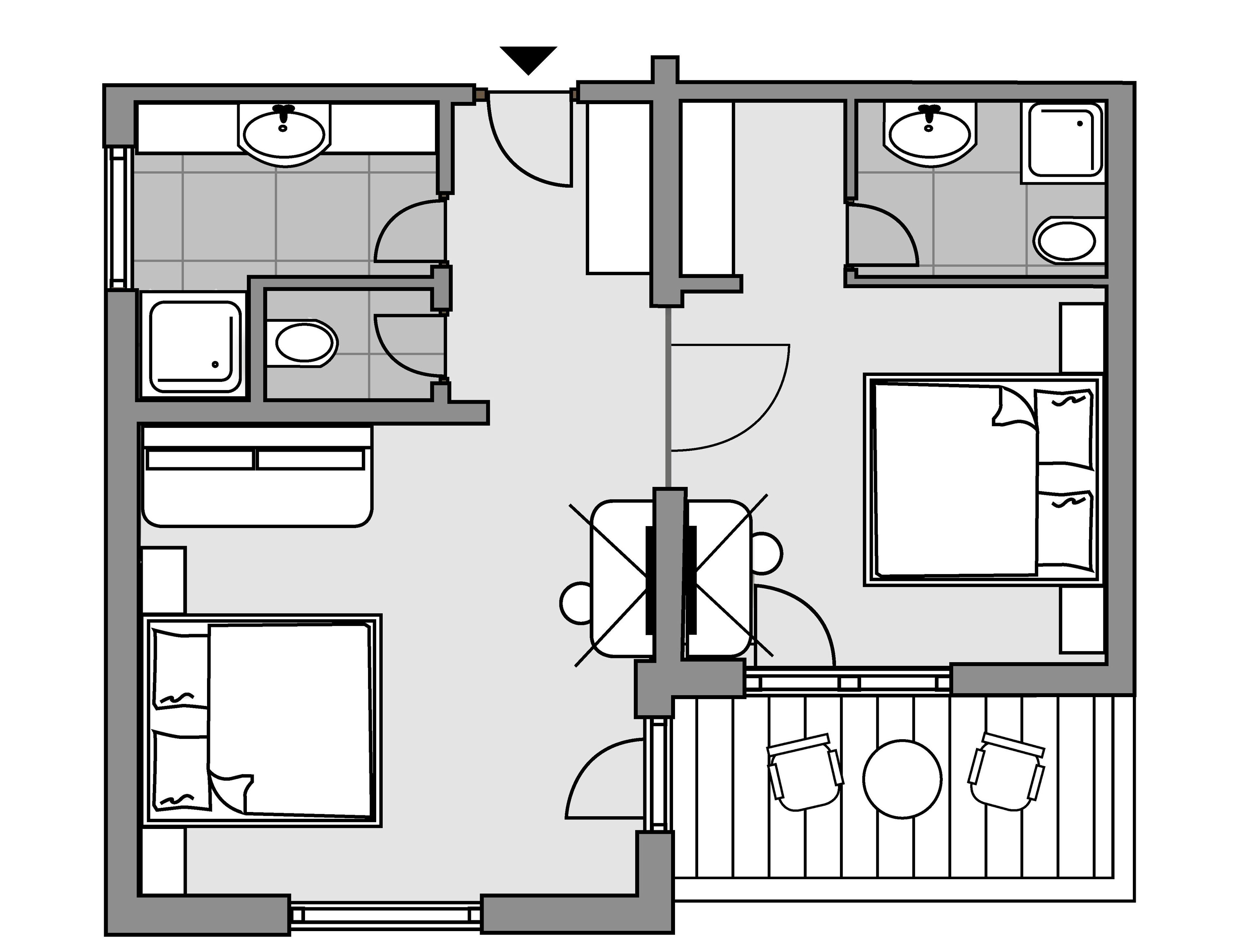 A floor plan of a hotel with a kitchen, two bathrooms, a dining area, and a seating area with tables and chairs.