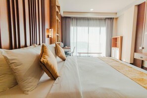 Suite familiar | Minibar y ropa de cama