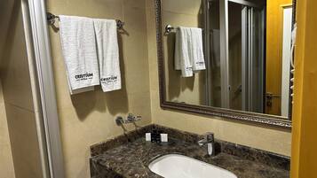Shower, free toiletries, hair dryer, towels