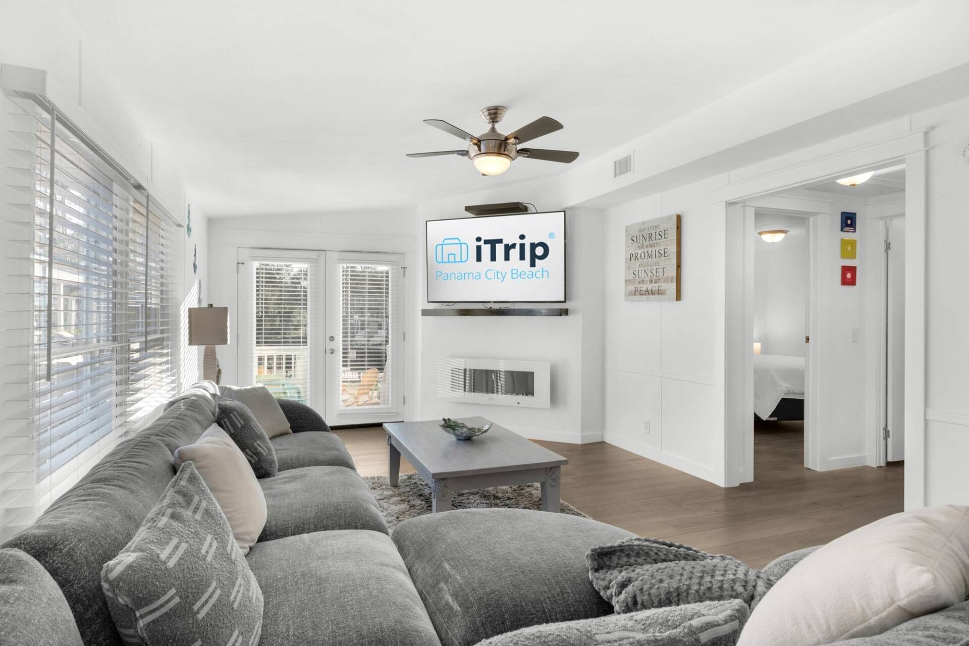 The cozy living area offers a large screen tv and electric fireplace