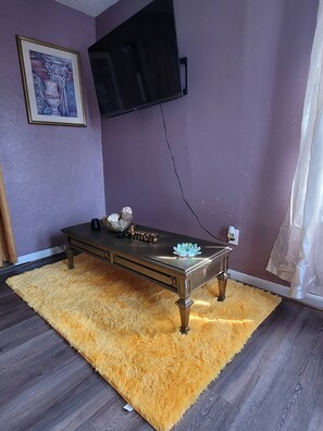 Apartment, 1 Bedroom, Garden View | Living room - Tower Of Little Italy (Niagara Falls)