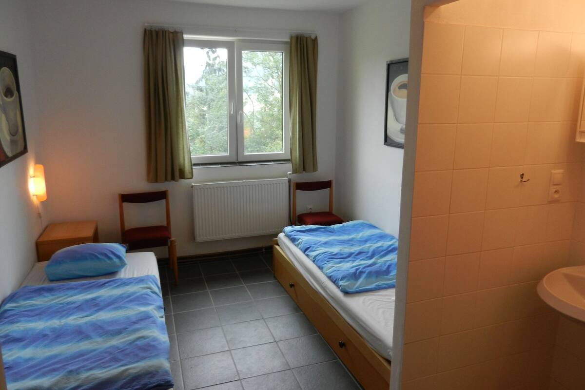 8 bedrooms, individually furnished, bed sheets