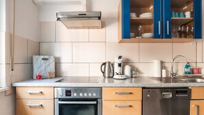 A modern kitchen with a Bosch oven, dishwasher, and coffee maker. - Holiday Home in Mahlberg in the Ortenau District (Mahlberg)