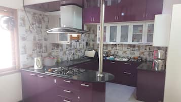 Fridge, stovetop, electric kettle, toaster