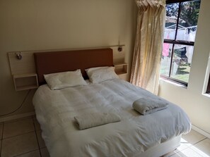 2 dormitorios, tabla de planchar con plancha, wifi y ropa de cama