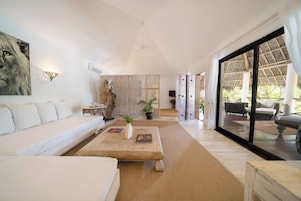 Superior Suite, Pool View | Premium bedding, minibar, in-room safe, desk