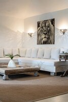 Superior Suite, Pool View | Premium bedding, minibar, in-room safe, desk