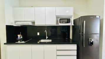 Fridge, microwave, stovetop, coffee/tea maker