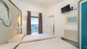 Family Room, 2 Bedrooms, Sea View | Minibar, soundproofing, free WiFi, bed sheets