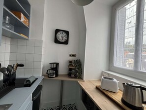 Fridge, microwave, coffee/tea maker, toaster