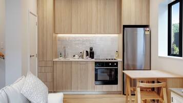 Townhome | Private kitchen | Fridge, microwave, oven, stovetop