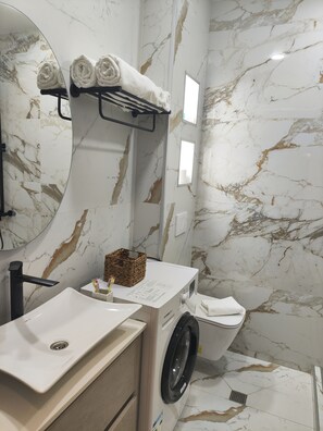 Hair dryer, towels, soap, shampoo - Sea View Apartment in Batumi, Georgia (Batumi)