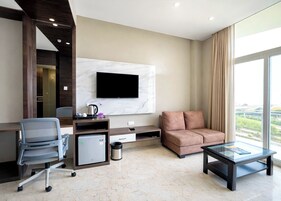 Premium bedding, desk, laptop workspace, soundproofing