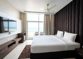 Premium bedding, desk, laptop workspace, soundproofing