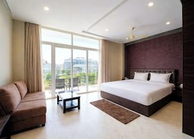 Premium bedding, desk, laptop workspace, soundproofing