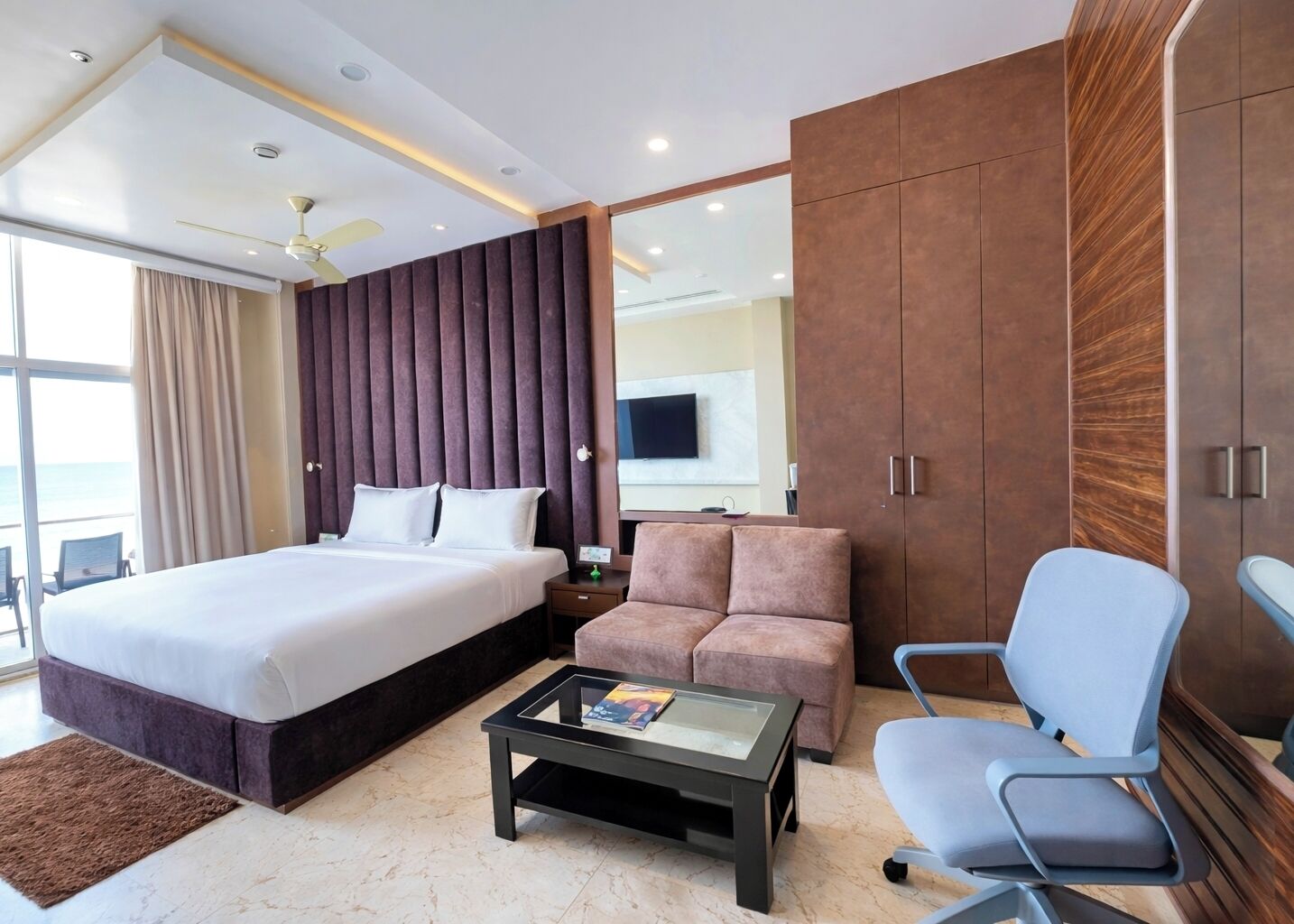 Premium bedding, desk, laptop workspace, soundproofing