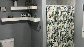 Shower, towels, soap, shampoo