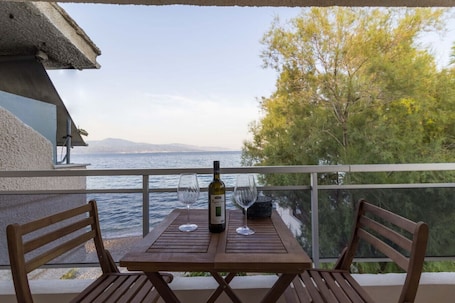 Outdoor dining. Seaside Serenity Suite in Loutra