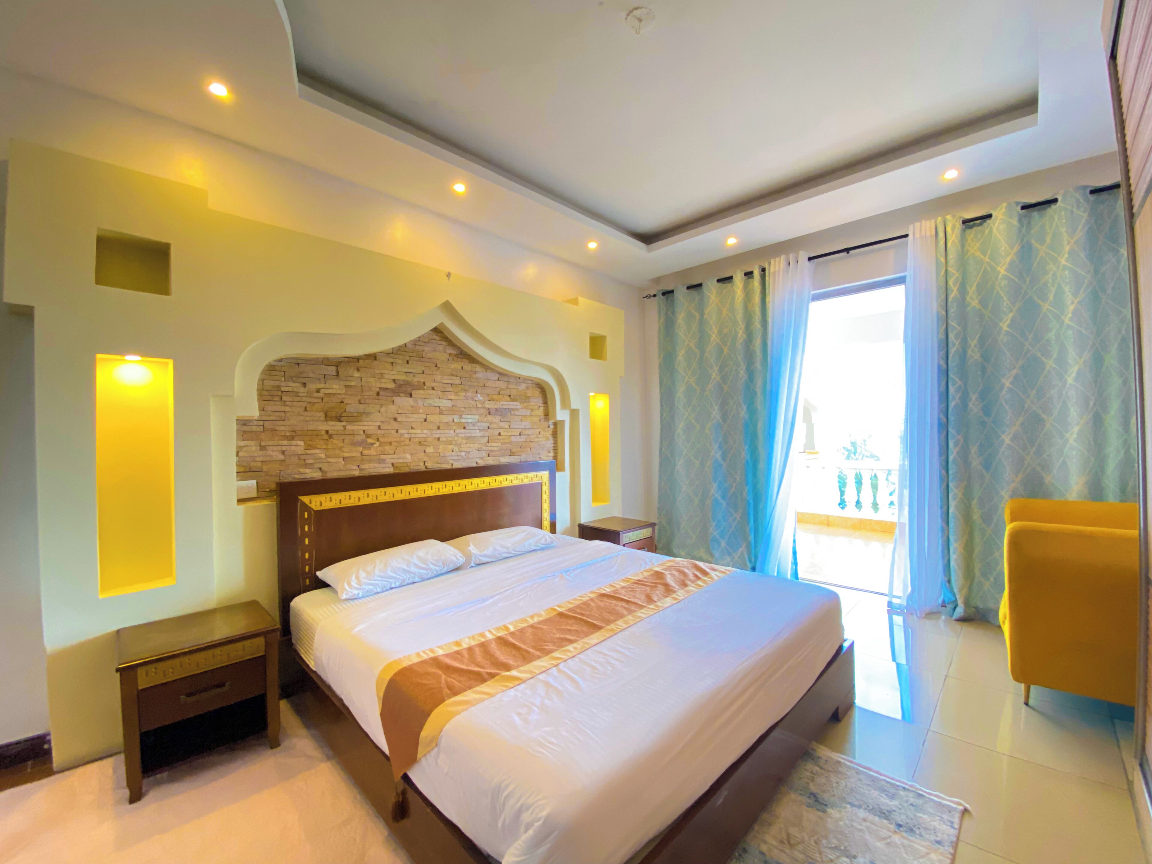 Deluxe Apartment, Partial Ocean View | 2 bedrooms, desk, laptop workspace, free WiFi