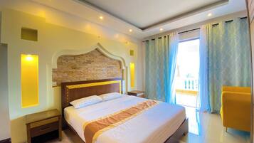 Deluxe Apartment, Partial Ocean View | 2 bedrooms, desk, laptop workspace, free WiFi