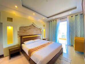 Deluxe Apartment, Partial Ocean View | 2 bedrooms, desk, laptop workspace, free WiFi - Mfalme Beachfront Apartments (Mombasa)