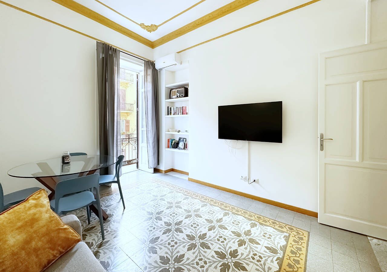 Basic Apartment | Living area | 32-inch flat-screen TV with cable channels