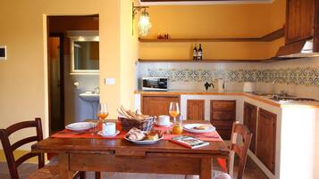 Maison Classique, 2 chambres | Cuisine privée | Four, chaise haute