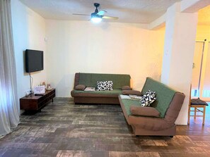 Casa clássico, 4 quartos | Sala de estar | Lareira