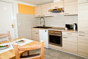 Classic Apartment, 3 Bedrooms | Private kitchen | Fridge, microwave, oven, dishwasher