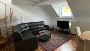 Living area - Modernes City-Duplex mit Netflix im City Center (Heidelberg)