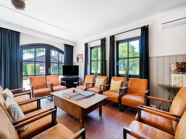 Classic House, Multiple Bedrooms | Living room | DVD player - Atmospheric Country House in Asten on a Golf Course (Heusden Gem Asten)