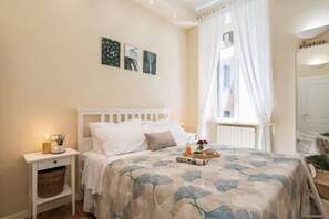 1 dormitorio, tabla de planchar con plancha, cuna de viaje y wifi