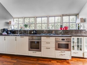 Private kitchen - Cosy Apartment in Sint Maartensbrug Near the Beaches (Sint Maartensbrug)