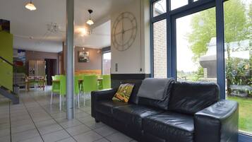 Comfort Villa, Multiple Bedrooms | Living room | DVD player