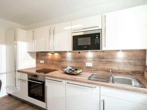Deluxe Apartment, 4 Bedrooms | Private kitchen - Luxurious Holiday Home in Saalbach-hinterglemm With Barbecue (Viehhofen)