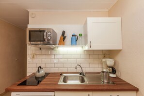 Classic Apartment, 1 Bedroom | Private kitchen | Fridge, microwave, stovetop, coffee/tea maker