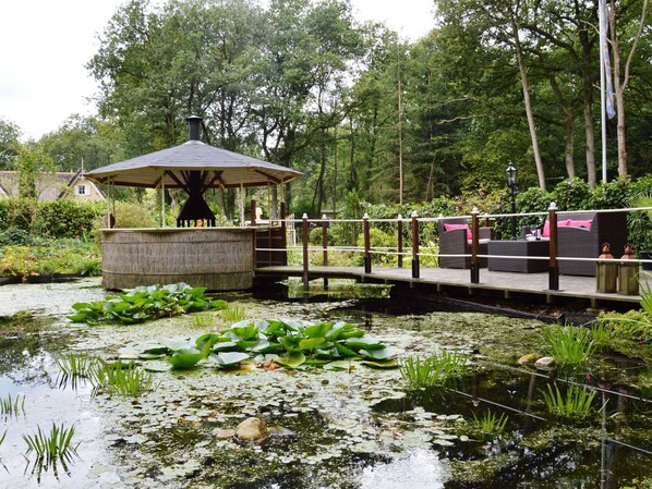 View from property - A Detached Bungalow With Outdoor Fireplace, Covered Terrace and Pond in a Forest Plot (Wateren)
