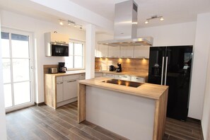 Comfort Chalet, Multiple Bedrooms | Private kitchen | Fridge, microwave, oven, stovetop
