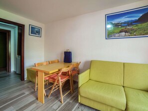 Apartamento conforto, 1 quarto | Sala de estar
